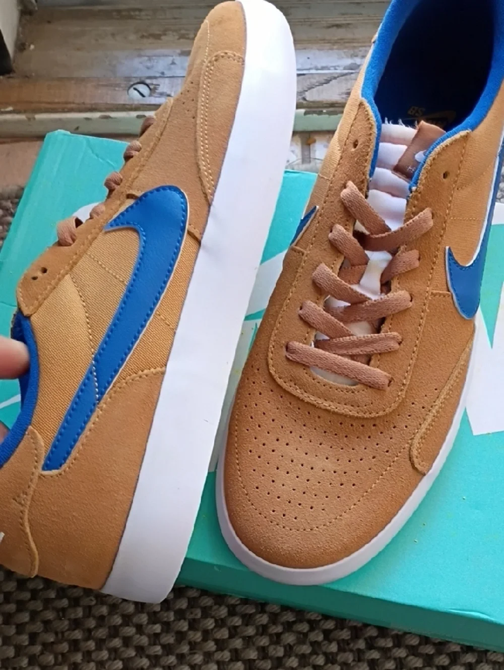 Nike Men’s Sneakers in Tan with Blue Swoosh
